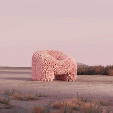 Fauteuil rose texturé dans un paysage désertique surréaliste, exposé à New FuTure à Barcelone. Fauteuil rose texturé dans un paysage désertique surréaliste, exposé à New FuTure à Barcelone.