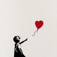 Banksy’s Girl With Balloon/Morons, stencil of child reaching for red heart balloon – Banksy in Amsterdam.