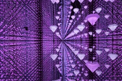 Immersive purple light diamond installation by Studio Irma at Moco Museum Barcelona.