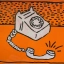 Keith Harings popart-schilderij van een telefoon op een feloranje achtergrond in Moco Museum Amsterdam.