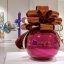 Jeff Koons' glossy sculpture Smooth Egg with Bow on display at Moco Museum London