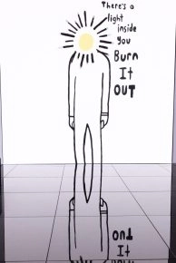 Minimalist burnout figure artwork by Robbie Williams with text, exhibited at Moco Museum Amsterdam.