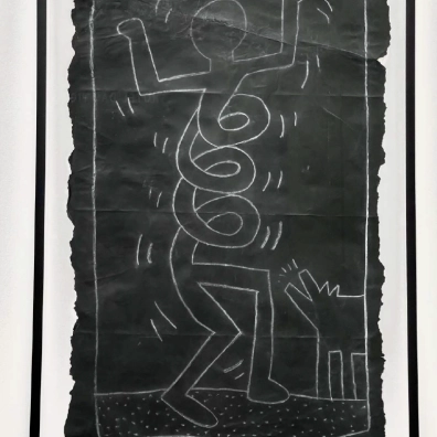 Keith Haring's chalk-style artwork displayed at Moco Museum Barcelona.