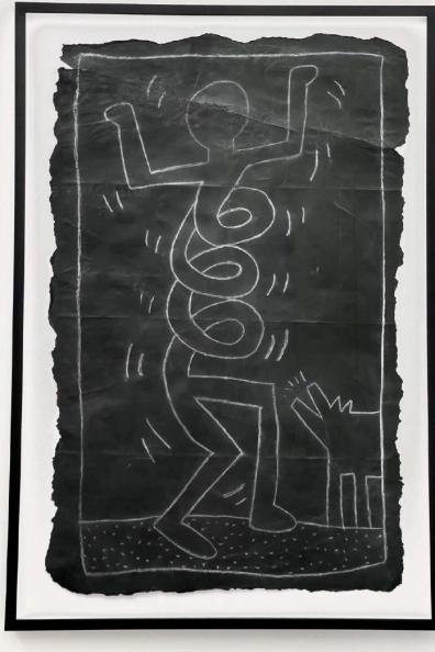 Keith Haring's chalk-style artwork displayed at Moco Museum Barcelona.