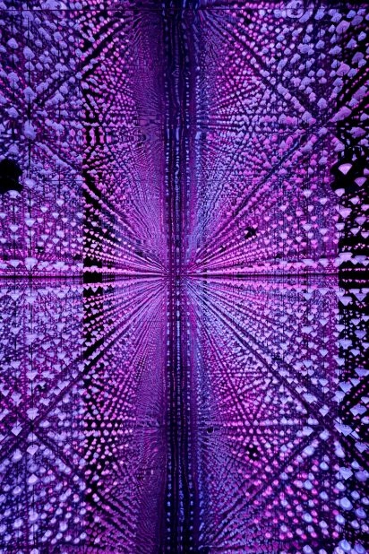 Studio Irma purple digital light tunnel in immersive installation at Moco Museum Amsterdam