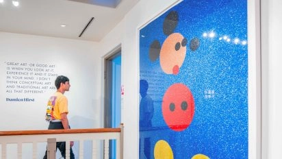 Large Takashi Murakami artwork featuring Mickey Mouse at Moco Museum Amsterdam.